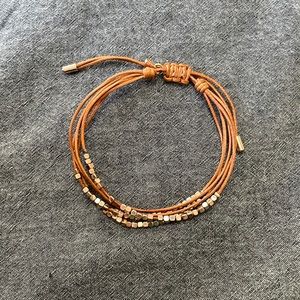 Fossil leather cord and rose gold beaded bracelet